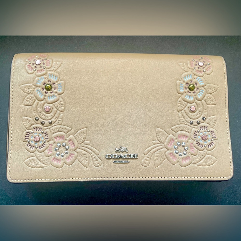 Embroidered beige leather Coach clutch
